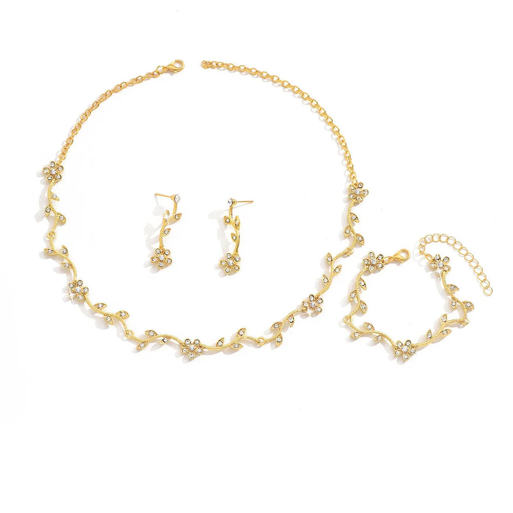 Maison Veyre Gold Floral Jewelry Set — Necklace, Earrings, Bracelet & Ring